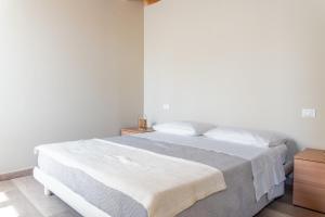 Postel nebo postele na pokoji v ubytování B&B San Rocco