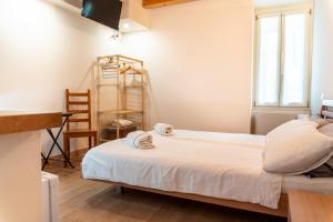 Postel nebo postele na pokoji v ubytování B&B San Rocco