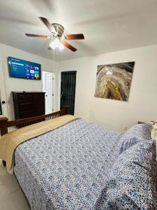 Ένα ή περισσότερα κρεβάτια σε δωμάτιο στο Miami Casa II