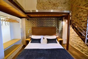 Postel nebo postele na pokoji v ubytování Rooms in Spello