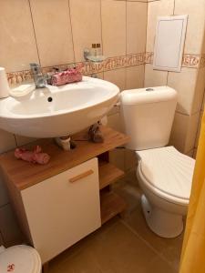 a bathroom with a sink and a toilet at Cozy studio in Sunny beach in Sunny Beach