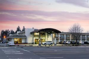 an empty parking lot in front of a building at Best Western Seattle Airport Hotel in SeaTac