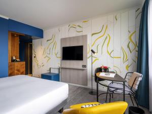 Ліжко або ліжка в номері Mercure Antwerp City Centre