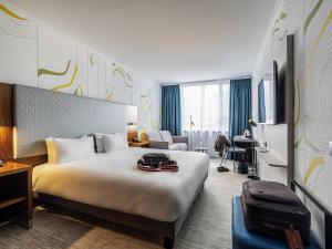 Ліжко або ліжка в номері Mercure Antwerp City Centre