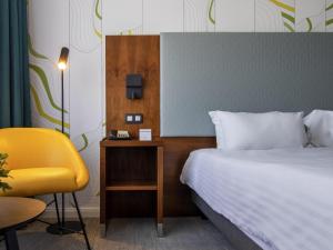 Ліжко або ліжка в номері Mercure Antwerp City Centre