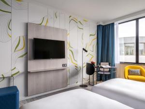 Ліжко або ліжка в номері Mercure Antwerp City Centre