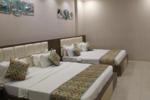 Hotel Annpurna Regency客房内的一张或多张床位