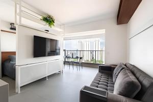 Μια τηλεόραση ή/και κέντρο ψυχαγωγίας στο Conforto e vista do 17º andar | A/C e Wi-Fi 500Mb