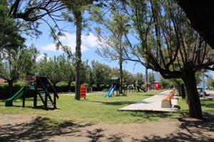 a park with a bunch of playground equipment at Casa di Agata in Torrenova +5 photos
