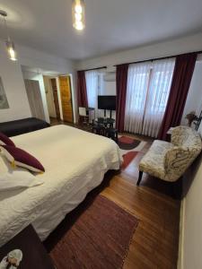Cama ou camas em um quarto em Hostal Boutique Casa La Barca