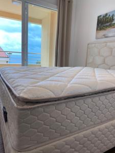 Ένα ή περισσότερα κρεβάτια σε δωμάτιο στο Apartman Royal Lino