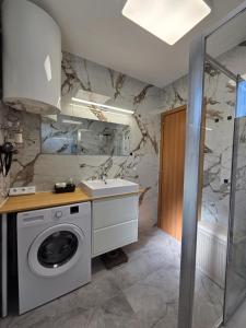 Koupelna v ubytování Apartman M & M, Schöne Wohnung nur 200m vom Strand