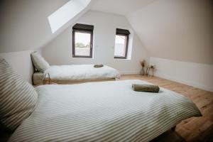 Postel nebo postele na pokoji v ubytování La Hacienda - Grande maison avec jardin