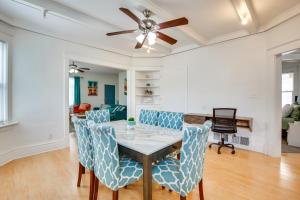 a dining room with a table and chairs at Luxurious 2BR Kansas City Condo Near Downtown in Kansas City