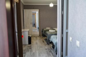 Rúm í herbergi á Hotel Elia Kazbegi