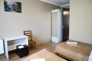 Rúm í herbergi á Hotel Elia Kazbegi