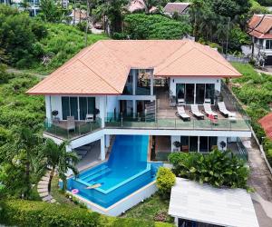 an aerial view of a house with an orange roof at Kamala Heights Villa in Kamala Beach