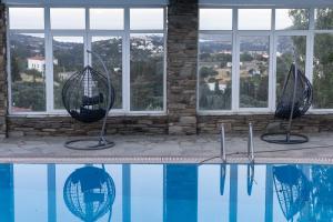 Bazén v ubytování Perla Pool Hotel Andros nebo v jeho okolí