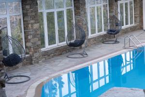 Bazén v ubytování Perla Pool Hotel Andros nebo v jeho okolí
