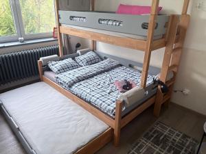 Postel nebo postele na pokoji v ubytování Apartmány IMLADRIS, Hotel u pralesa