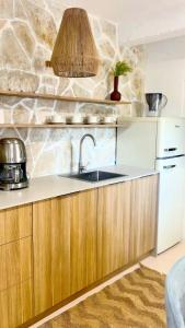 Kuchyň nebo kuchyňský kout v ubytování Apartmani-Okrug Gornji-Ciovo