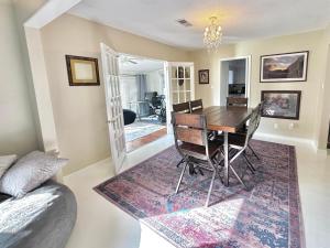 a dining room with a table and chairs at Big, Tidy, Cushy, & Activities in Madison