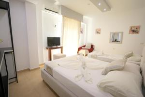 TV a/nebo společenská místnost v ubytování Hotel Soan