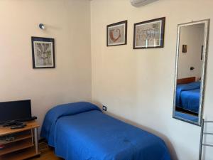 Ένα ή περισσότερα κρεβάτια σε δωμάτιο στο La Meridiana Bed & Bike