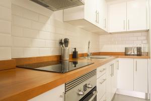 Køkken eller tekøkken på Playa San Juan Costa Relax