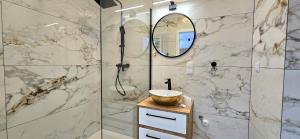 Koupelna v ubytování Apartament Brzeźno Breeze by TriApart + 23 fotografií
