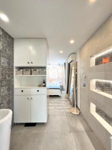 Η κουζίνα ή μικρή κουζίνα στο Suite deluxe en Kharisma