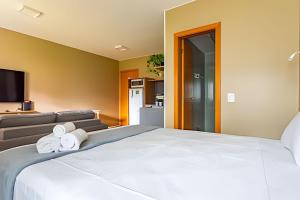 Ένα ή περισσότερα κρεβάτια σε δωμάτιο στο Studio Charme Central Park