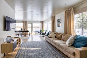 Posezení v ubytování Arctic Snow Lake Lodge