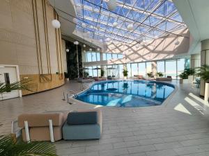 Πισίνα στο ή κοντά στο Elite 1BR Roka Lounge, Financial Harbour