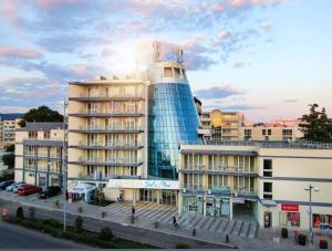 a building with a glass dome on top of it at Hotel Solemar in Sunny Beach