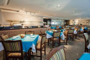 A restaurant or other place to eat at Oceano Copacabana Hotel