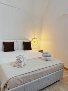 Ένα ή περισσότερα κρεβάτια σε δωμάτιο στο Amaterra Apulian Home