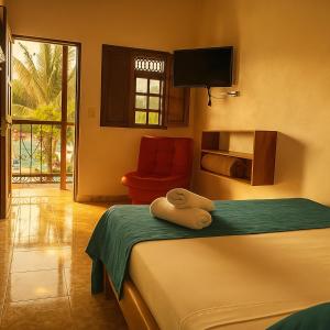 Postel nebo postele na pokoji v ubytování Hotel Dulce Campestre