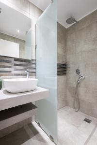 Koupelna v ubytování By the Sea Apartments-studios