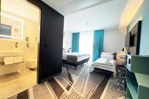Ένα ή περισσότερα κρεβάτια σε δωμάτιο στο Holiday Inn - the niu, Flash Berlin Charlottenburg by IHG