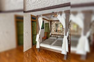 a model of a bedroom in a house at Voltera Apartments in Betina Old Town, with Parking Nearby in Betina +189 photos