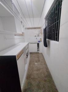 Kuchyň nebo kuchyňský kout v ubytování Apartamento temporada