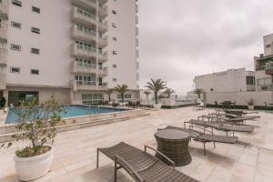 The swimming pool at or close to Royalty Barra Hotel