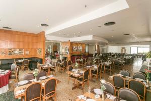 Restoran atau tempat lain untuk makan di Royalty Barra Hotel