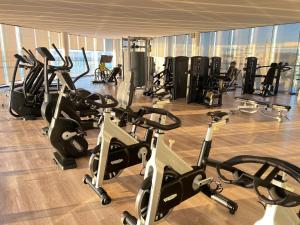 a gym with a bunch of exercise bikes in a room at Tizate Residents 202 in Cruz de Huanacaxtle