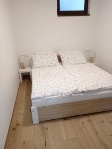 Postel nebo postele na pokoji v ubytování Rekreační dům
