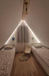 Postel nebo postele na pokoji v ubytování Holiday home Pine nest