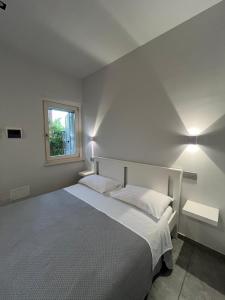 Postel nebo postele na pokoji v ubytování Dimora Dana + 37 fotografií