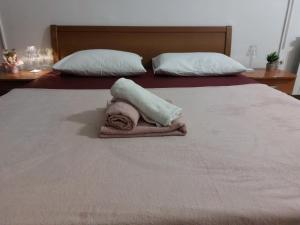 Postel nebo postele na pokoji v ubytování Rooms royal