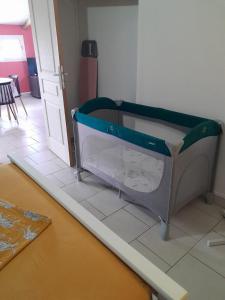 Una cama o camas en una habitación de Le Paradis